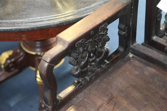 Two Chinese rosewood armchairs, late 19th century,